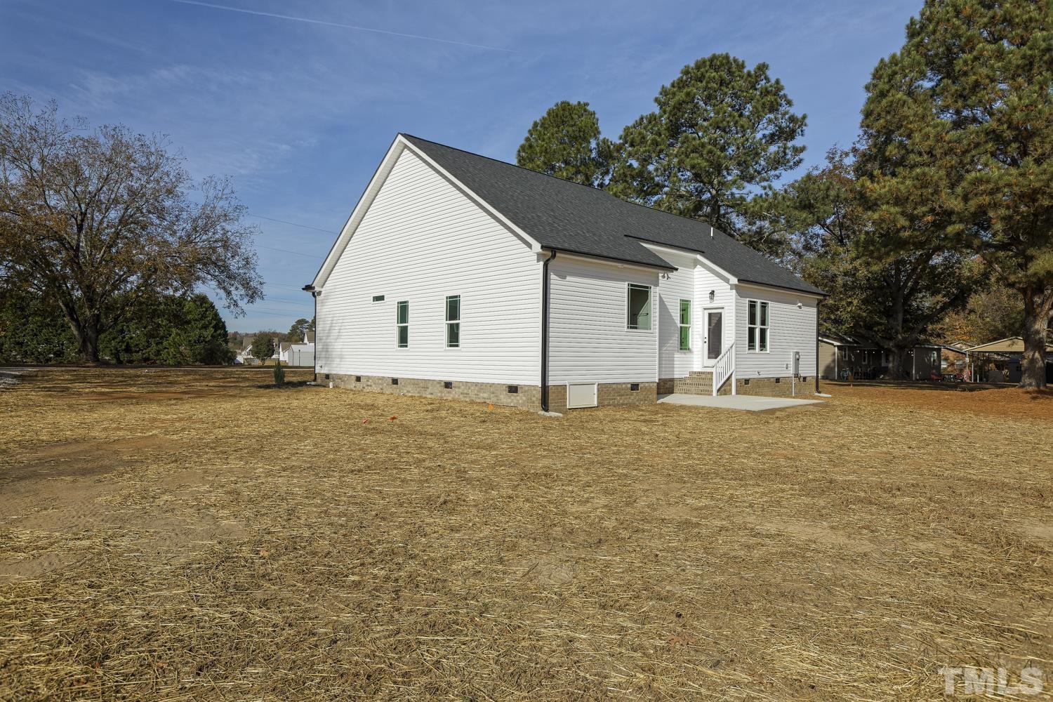 1004 Butler Drive Erwin, NC 28339 - Photo 37 of 38 a view of white house with a yard