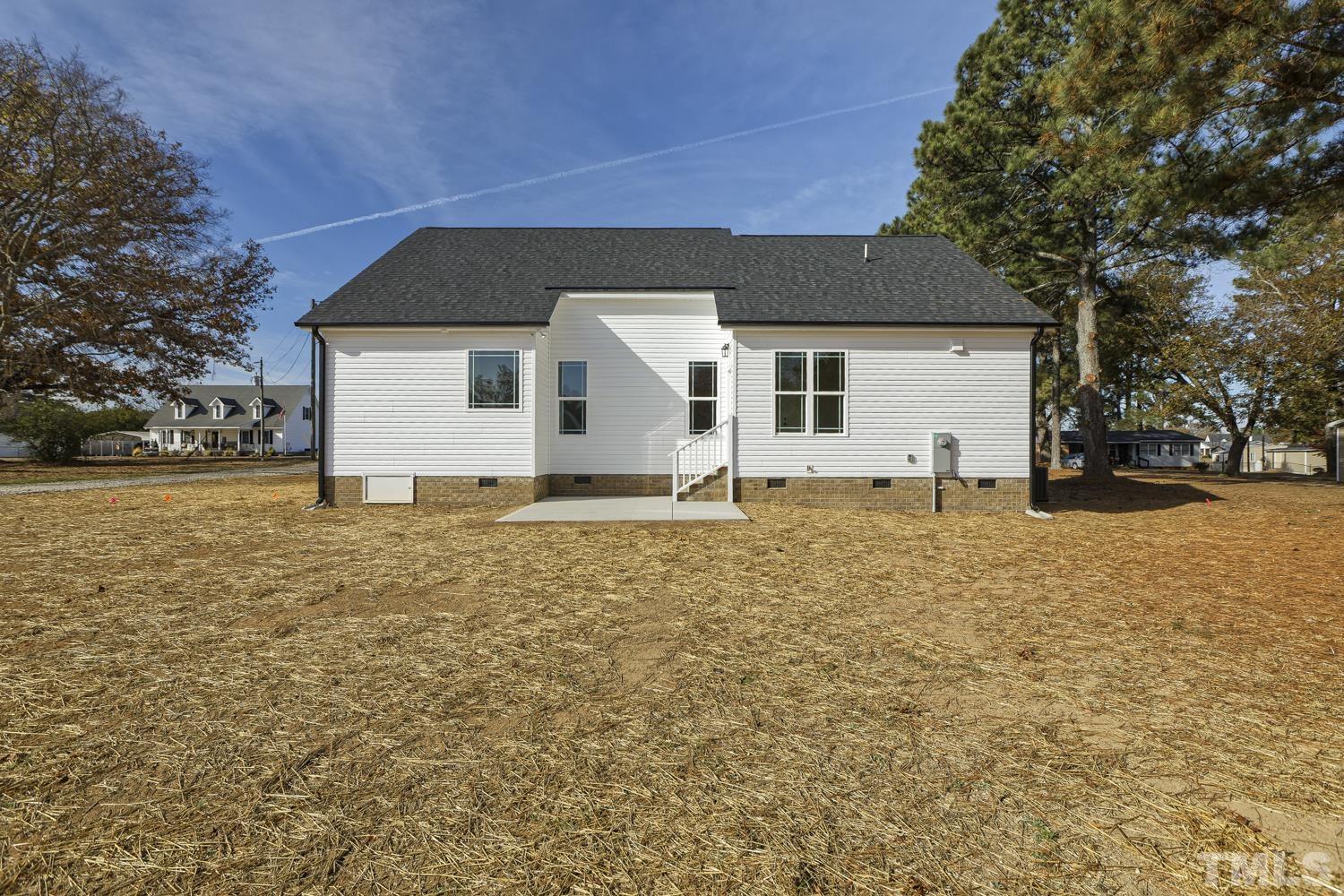 1004 Butler Drive Erwin, NC 28339 - Photo 38 of 38 a front view of house with yard and trees
