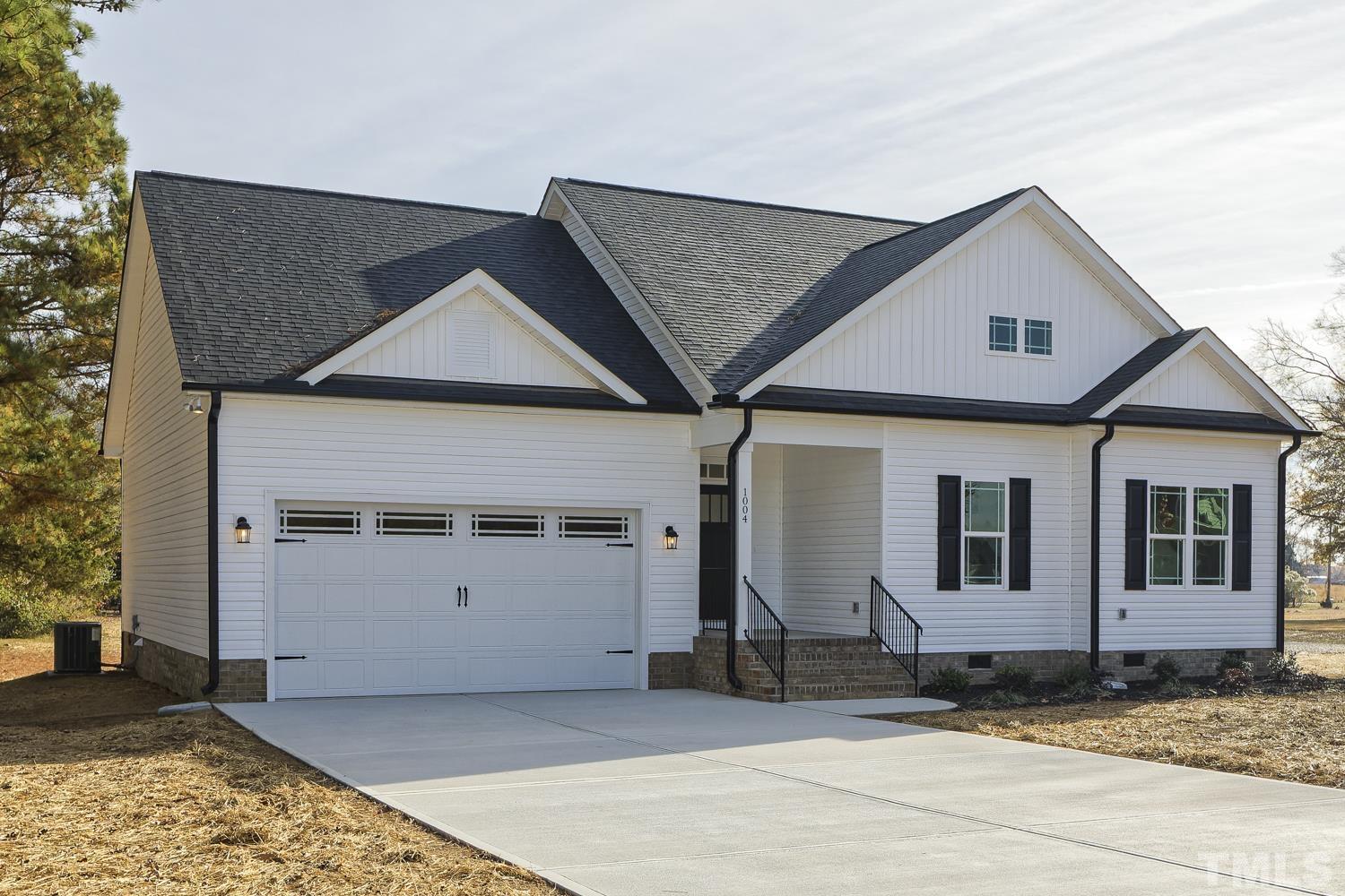 1004 Butler Drive Erwin, NC 28339 - Photo 4 of 38 a house view with a outdoor space