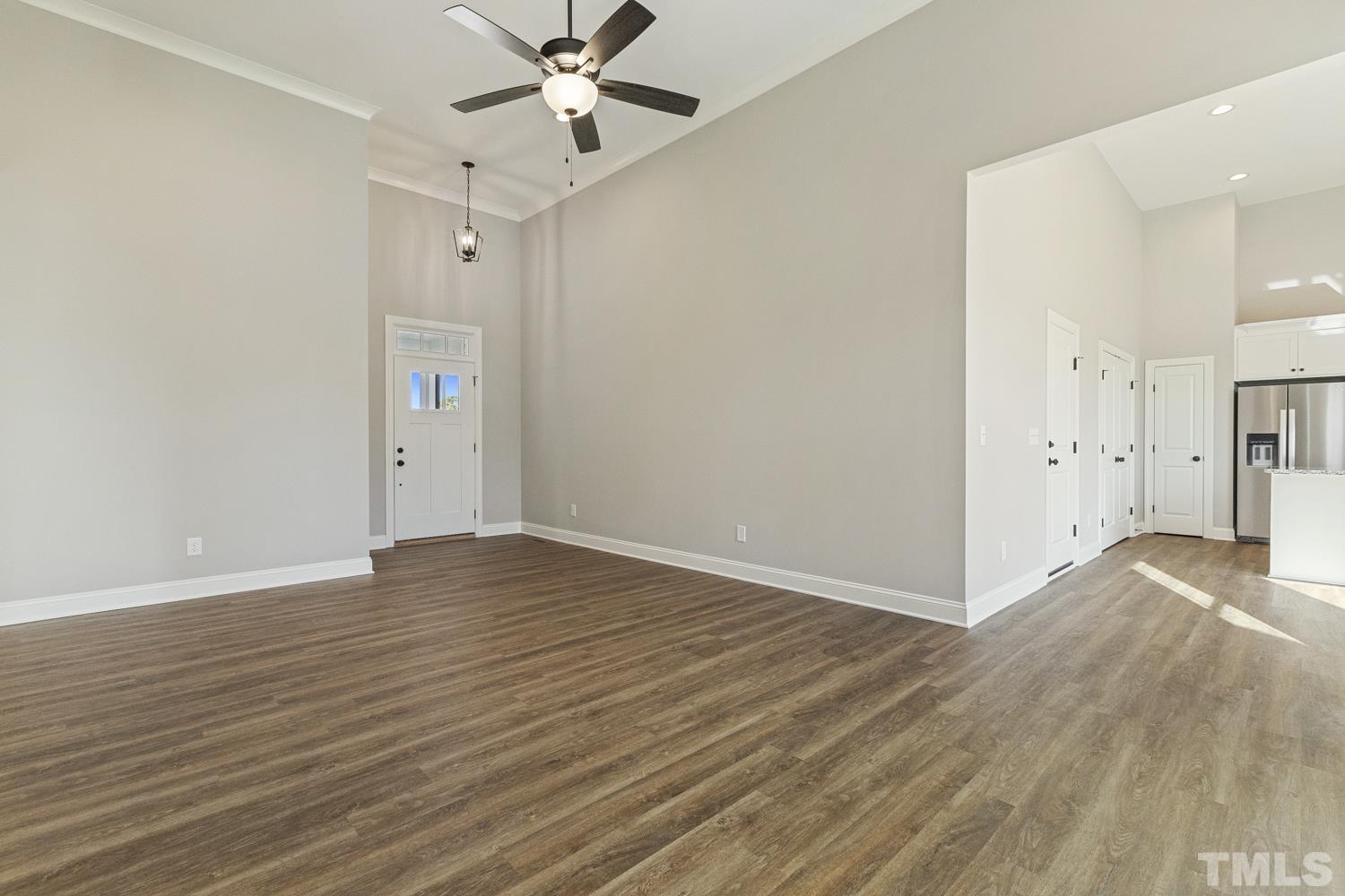 1004 Butler Drive Erwin, NC 28339 - Photo 10 of 38 a view of an empty room and wooden floor