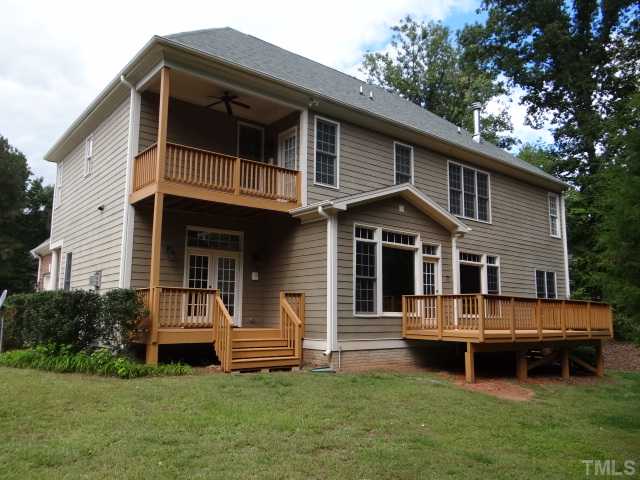 2209 Customs House Court Raleigh, NC 27615 - Photo 14 of 14 a view of a house with a yard