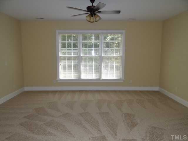 2209 Customs House Court Raleigh, NC 27615 - Photo 8 of 14 an empty room with a window