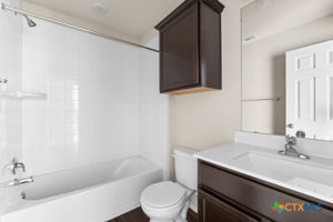 210 Highmore Court Temple, TX 76502 - Photo 14 of 15 a bathroom with a sink and a toilet