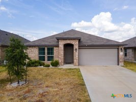 210 Highmore Court Temple, TX 76502 - Photo 2 of 15 a front view of a house with garden