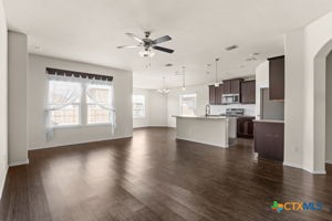 210 Highmore Court Temple, TX 76502 - Photo 4 of 15 a view of an empty room with kitchen appliances and a window