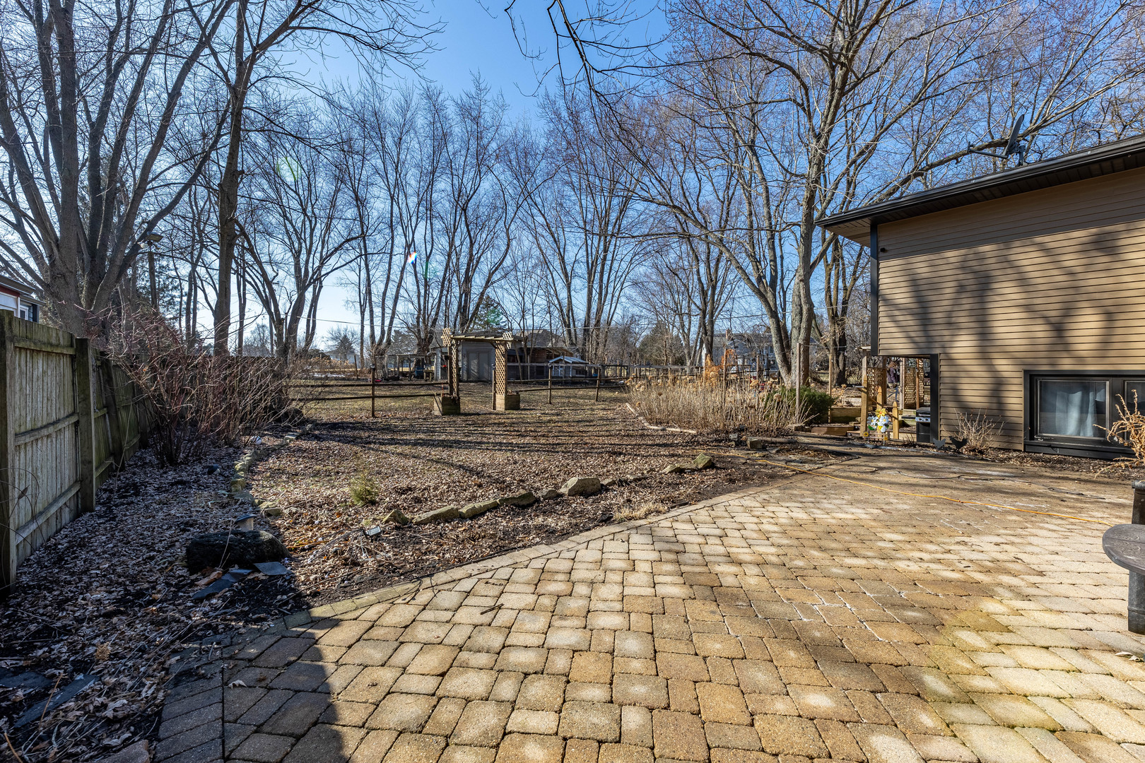 41W461 Burlington Road Campton Hills, IL 60175 - Photo 27 of 32 a view of a house with a yard
