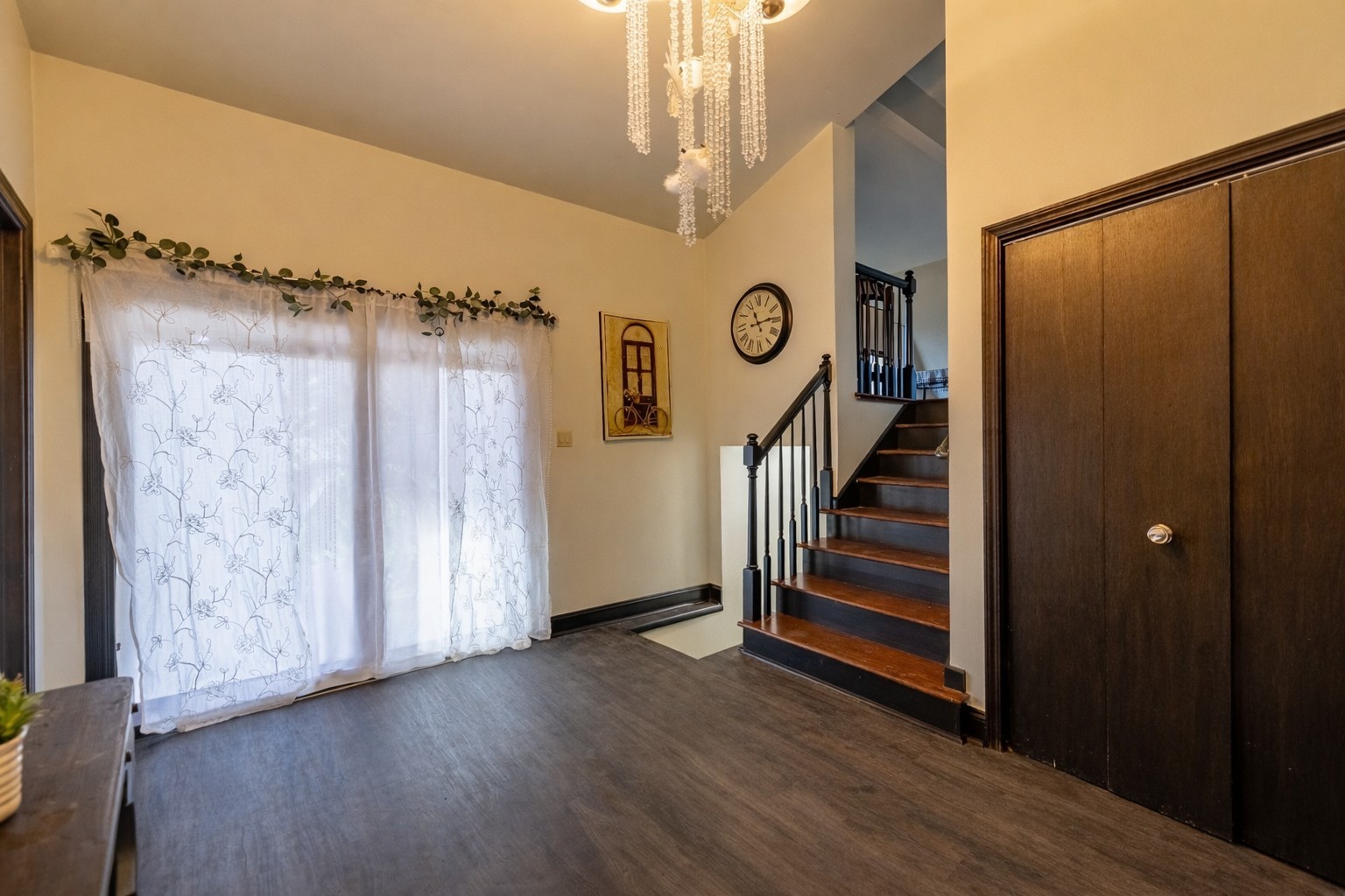 41W461 Burlington Road Campton Hills, IL 60175 - Photo 4 of 32 a view of a hallway with wooden floor and entryway