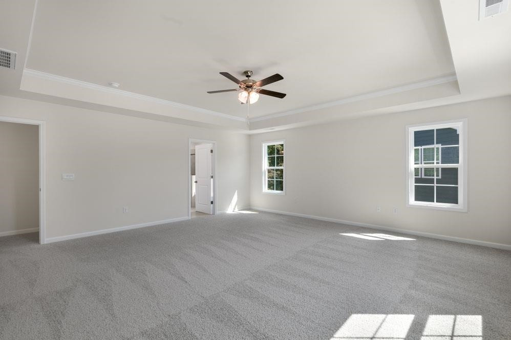 5129 Lizard Tail Lane Raleigh, NC 27603 - Photo 37 of 49 wooden floor in an empty room with a window