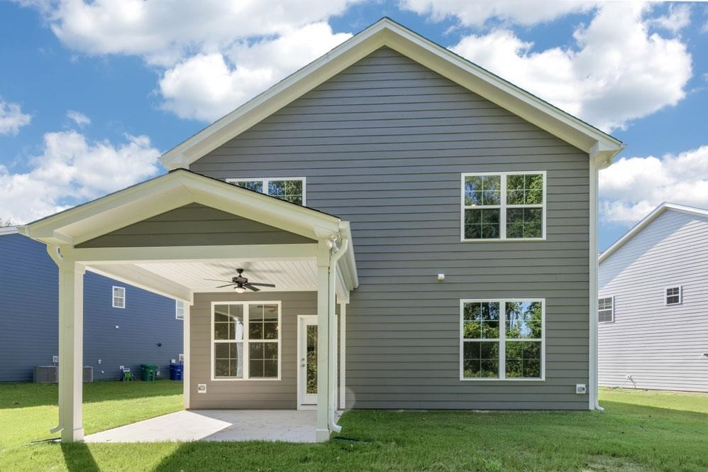 5129 Lizard Tail Lane Raleigh, NC 27603 - Photo 38 of 49 a front view of a house with a yard