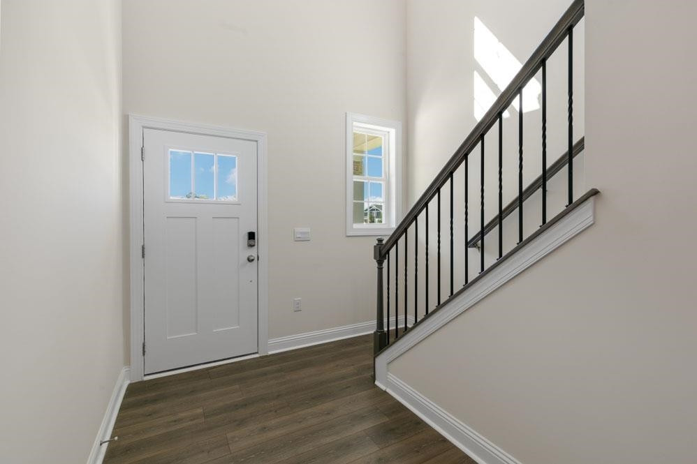5129 Lizard Tail Lane Raleigh, NC 27603 - Photo 9 of 49 a view of entryway with wooden floor
