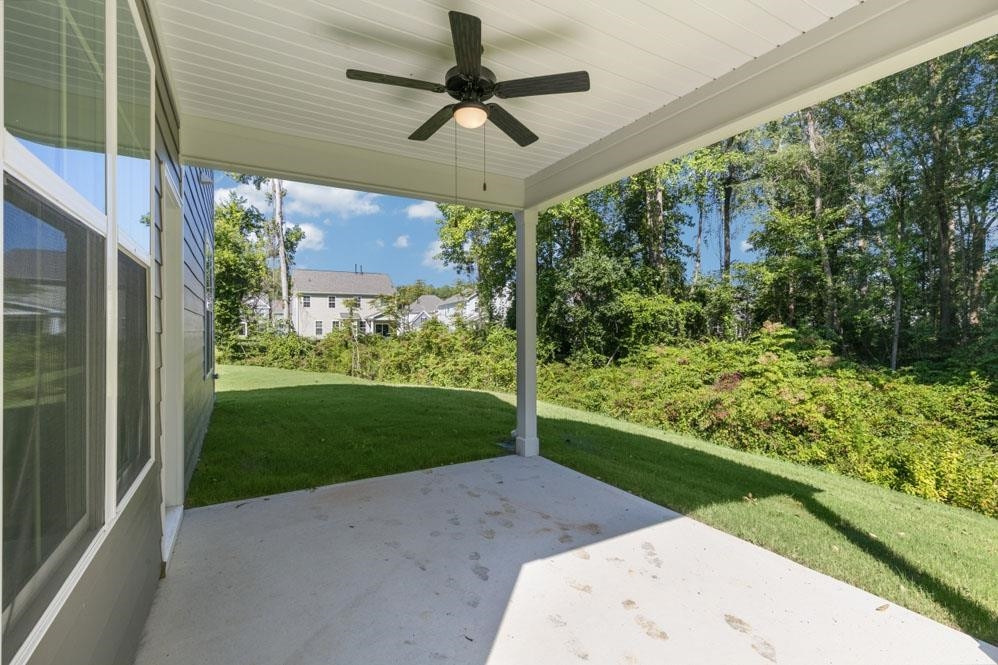 5129 Lizard Tail Lane Raleigh, NC 27603 - Photo 10 of 49 a view of a porch with a yard
