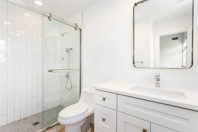 a bedroom with a bed and a cabinets