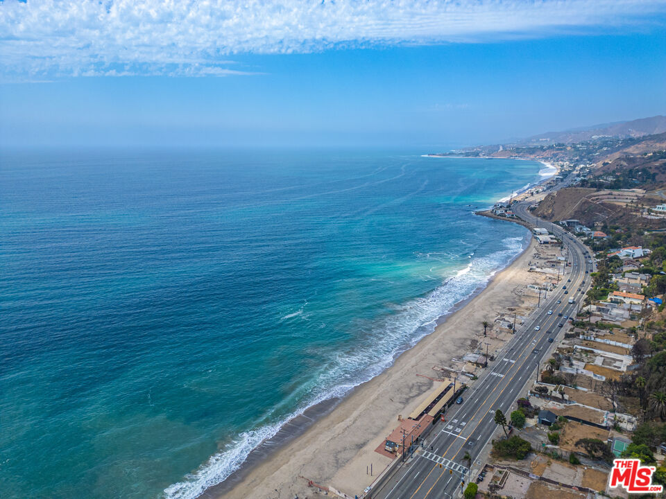 21415 Rambla Vista Malibu, CA 90265 - Photo 12 of 15 a view of an ocean from a balcony