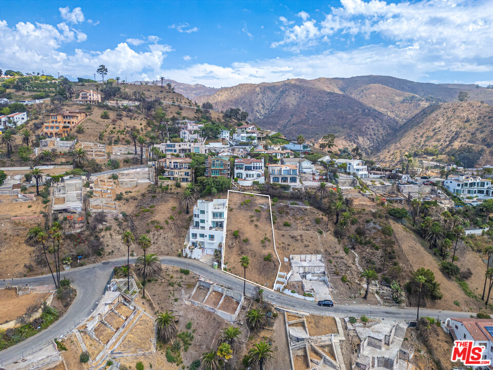 21415 Rambla Vista Malibu, CA 90265 - Photo 2 of 15 an aerial view of a house with a yard