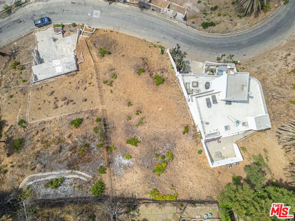 21415 Rambla Vista Malibu, CA 90265 - Photo 6 of 15 an aerial view of a house with a swimming pool