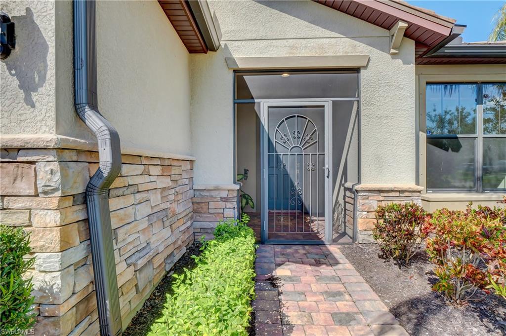 10894 Dennington Road Fort Myers, FL 33913 - Photo 3 of 49 entry has separate covered porch as you enter