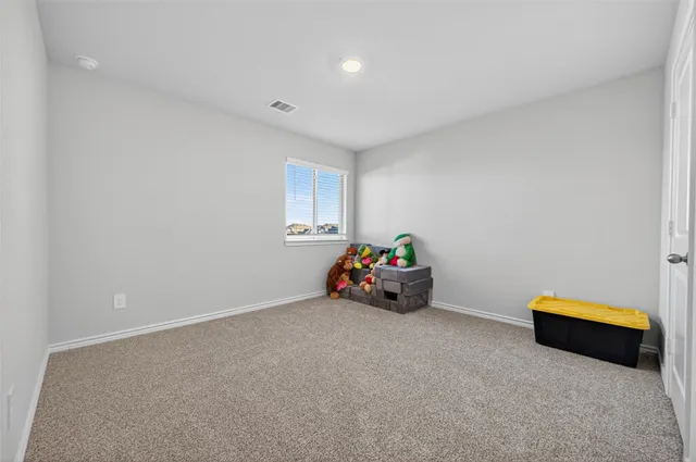 a view of car sitting in a room