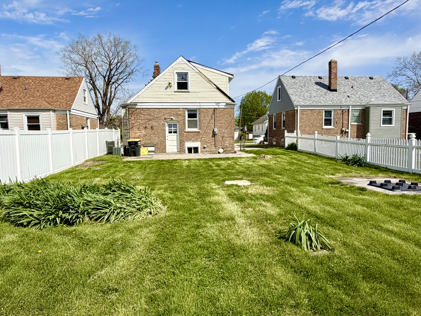 17826 School Street Lansing, IL 60438 - Photo 3 of 23 a front view of a house with a yard