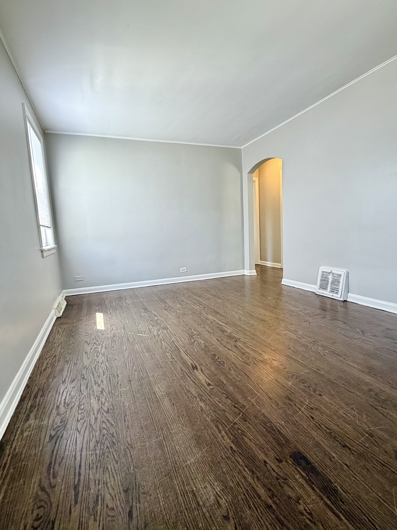 17826 School Street Lansing, IL 60438 - Photo 6 of 23 a view of an empty room and window