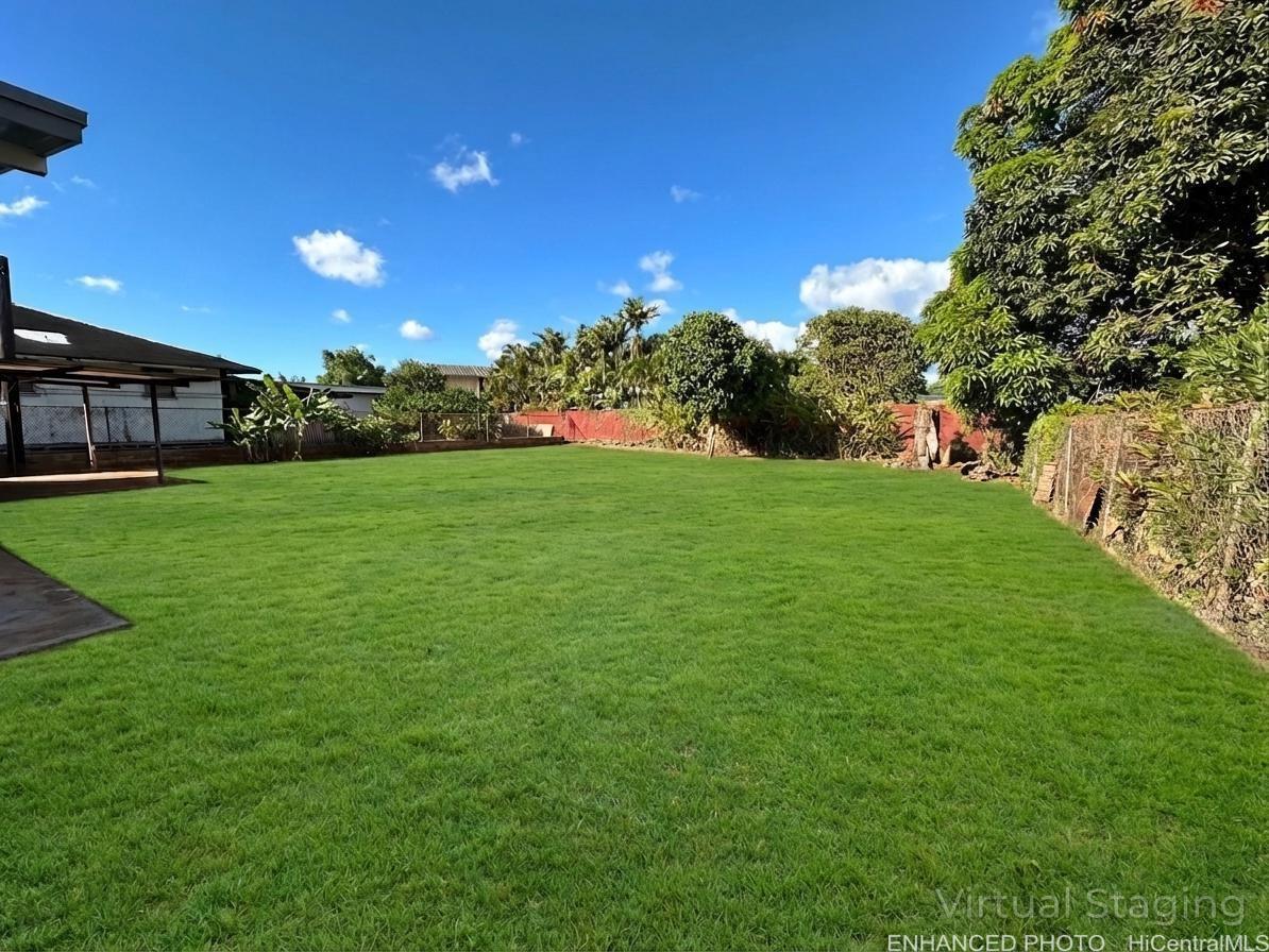 62-106 Emerson Road Haleiwa, HI 96712 - Photo 2 of 18 Enhanced. View of backyard.