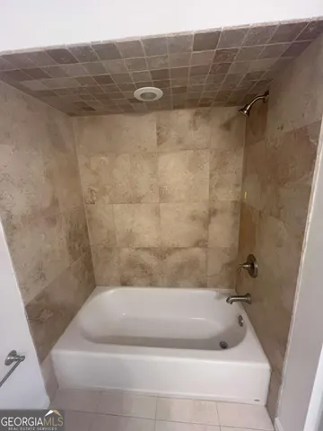 a bathroom with a bathtub