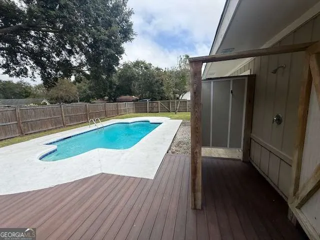 a view of a mini pool with wooden floor