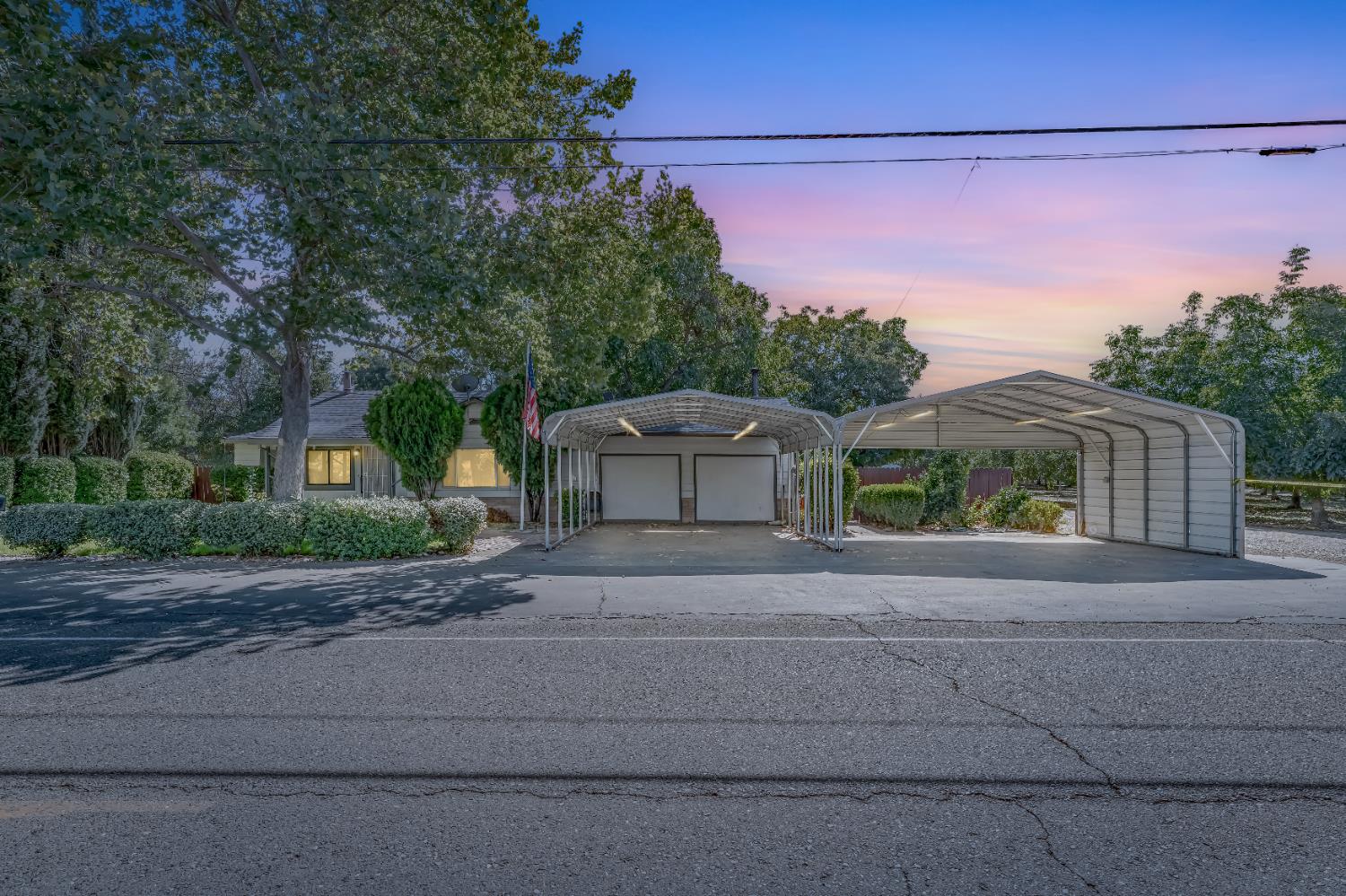 3800 Oswald Road Yuba City, CA 95993 - Photo 1 of 1 a front view of a house with a yard and garage