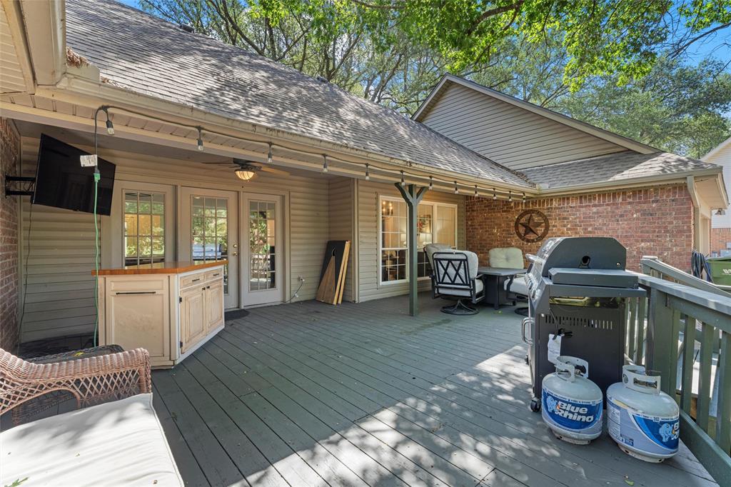 3000 Chimney Hill Drive Waco, TX 76708 - Photo 25 of 37 a view of a patio with table and chairs