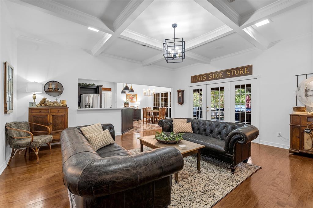 3000 Chimney Hill Drive Waco, TX 76708 - Photo 5 of 37 a living room with furniture and a chandelier