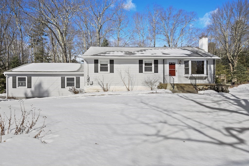 45 Bay Path Road Charlton, MA 01507 - Photo 1 of 35 a view of a white house with a large tree in front of it