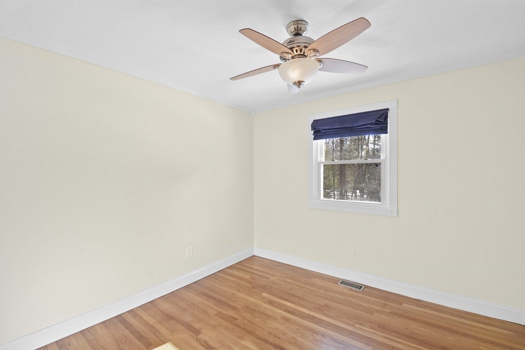 45 Bay Path Road Charlton, MA 01507 - Photo 8 of 35 a view of an empty room with wooden floor