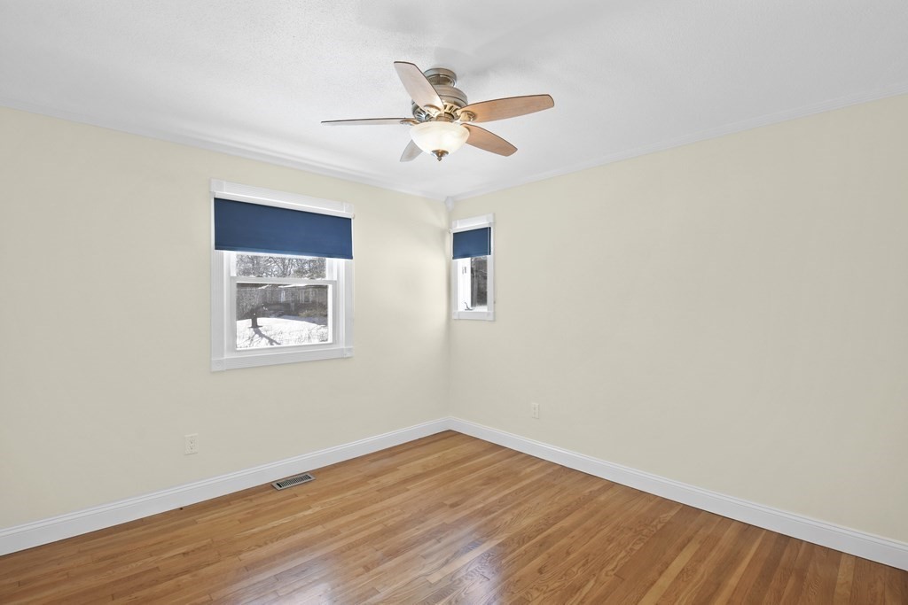 45 Bay Path Road Charlton, MA 01507 - Photo 10 of 35 wooden floor in an empty room with a window