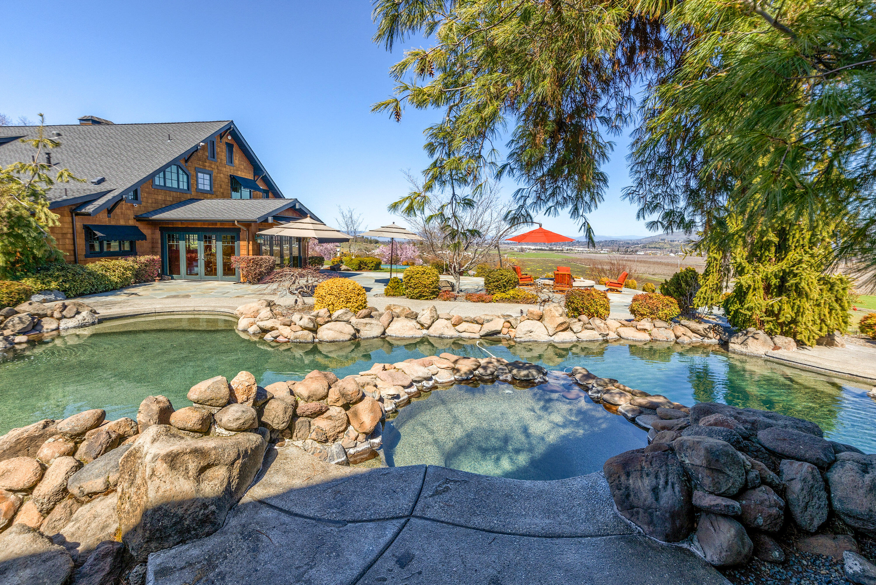 4167 Independence School Road Medford, OR 97501 - Photo 48 of 95 Pool, waterfalls and jacuzzi