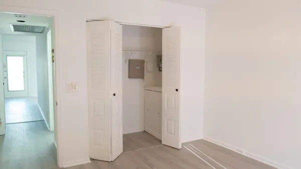 a bathroom with a toilet and a bathtub