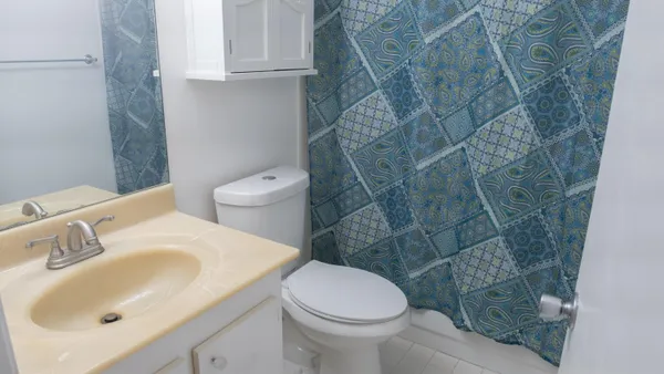 a view of a forest from a balcony