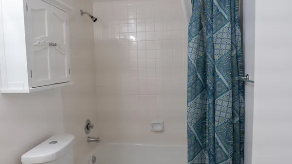 a view of a glass door and the balcony