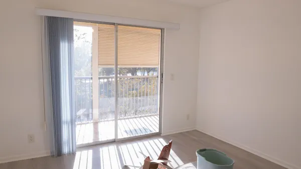 a bathroom with a mirror and a shower