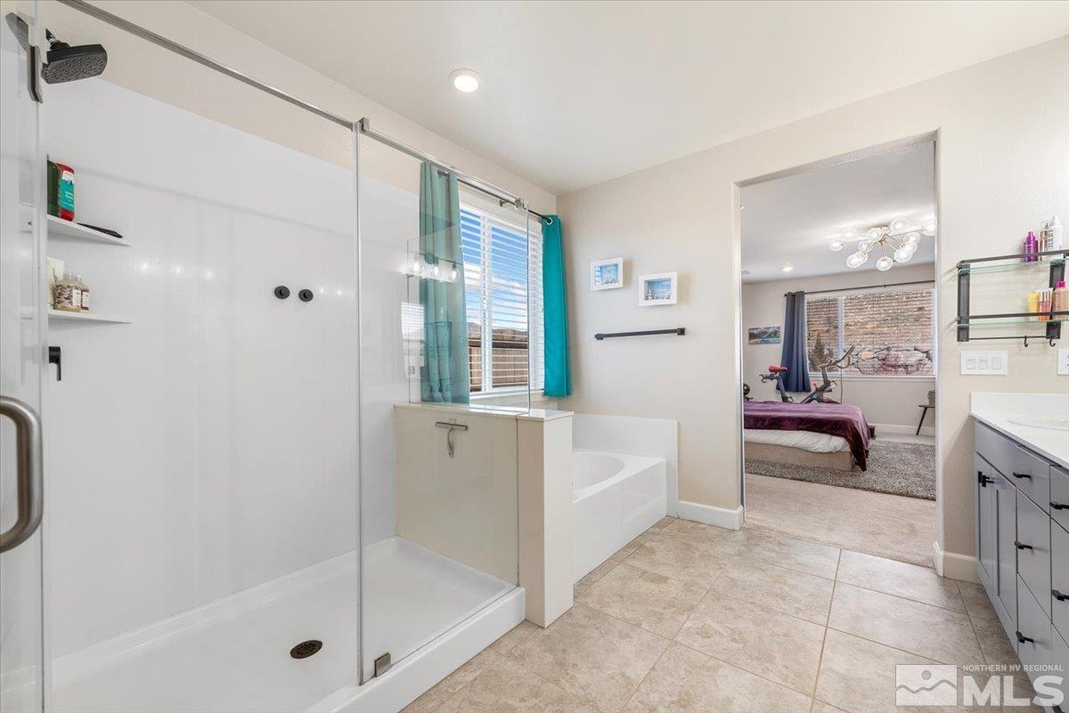 2711 McCauley Ranch Boulevard Reno, NV 89521 - Photo 20 of 40 a bathroom with a tub sink and shower
