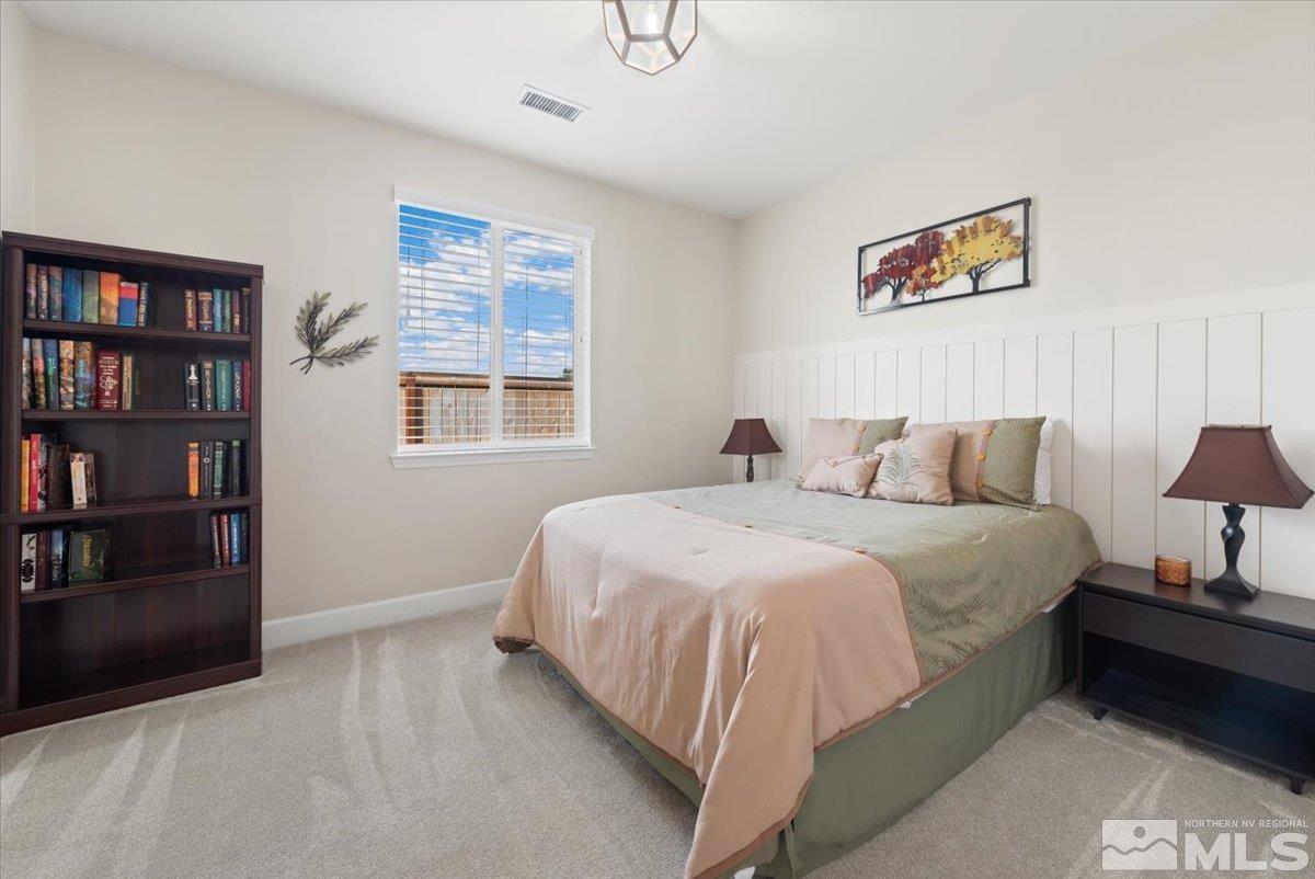 2711 McCauley Ranch Boulevard Reno, NV 89521 - Photo 30 of 40 a bedroom with bed and window