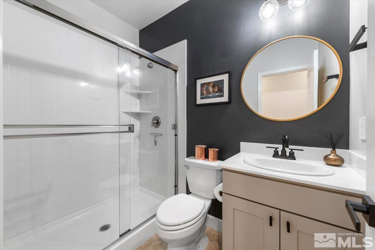 2711 McCauley Ranch Boulevard Reno, NV 89521 - Photo 33 of 40 a bathroom with a sink toilet and shower
