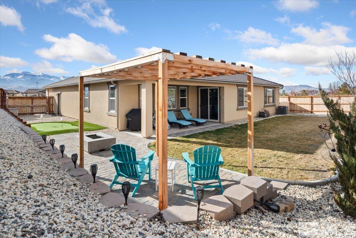 2711 McCauley Ranch Boulevard Reno, NV 89521 - Photo 36 of 40 a view of a chair and tables in the patio