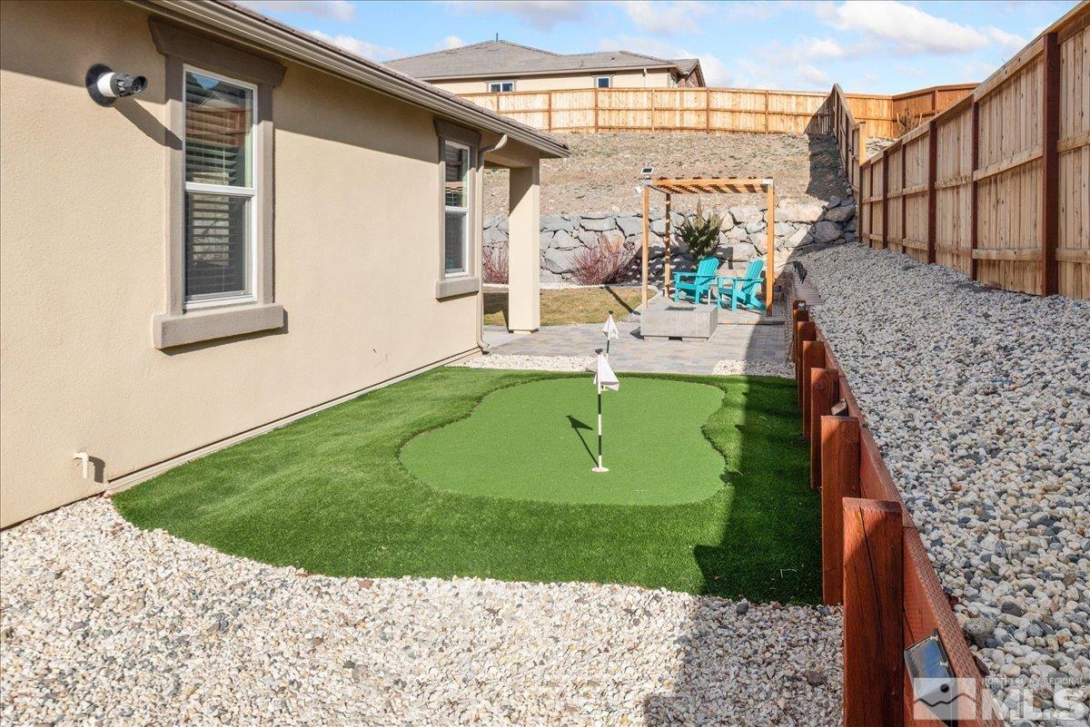 2711 McCauley Ranch Boulevard Reno, NV 89521 - Photo 37 of 40 a view of a house with a backyard