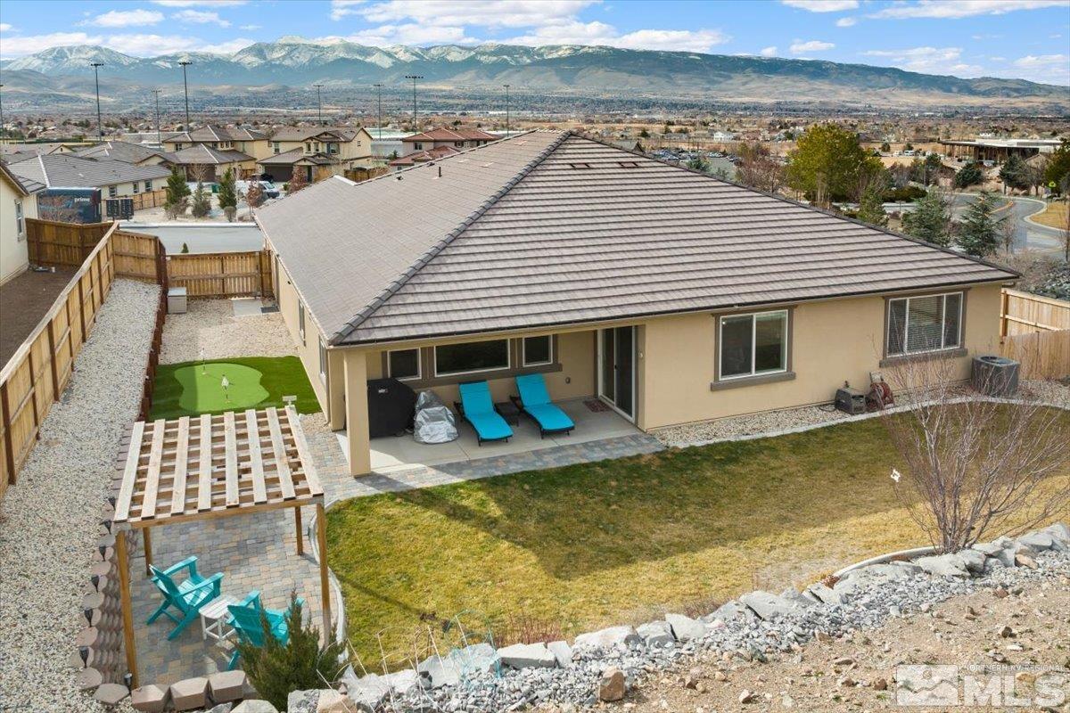2711 McCauley Ranch Boulevard Reno, NV 89521 - Photo 38 of 40 a view of a house with pool and ocean view
