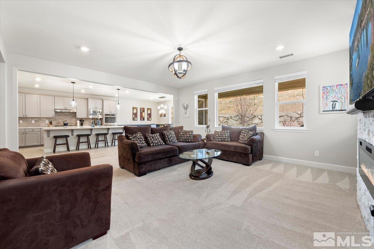 2711 McCauley Ranch Boulevard Reno, NV 89521 - Photo 9 of 40 a living room with furniture kitchen view and a window