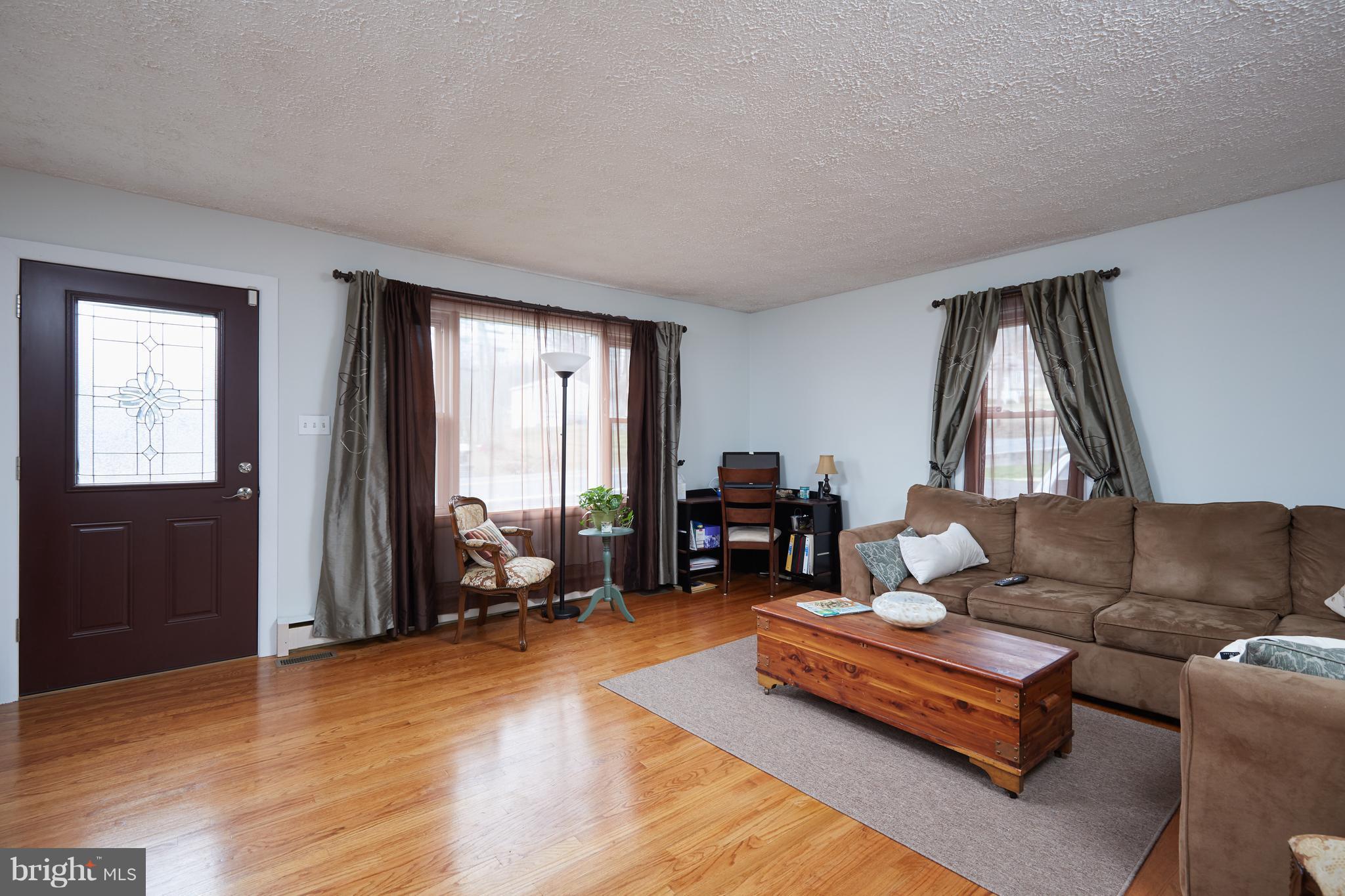 4910 Old Swimming Pool Road Frederick, MD 21703 - Photo 2 of 26 a living room with furniture and a window