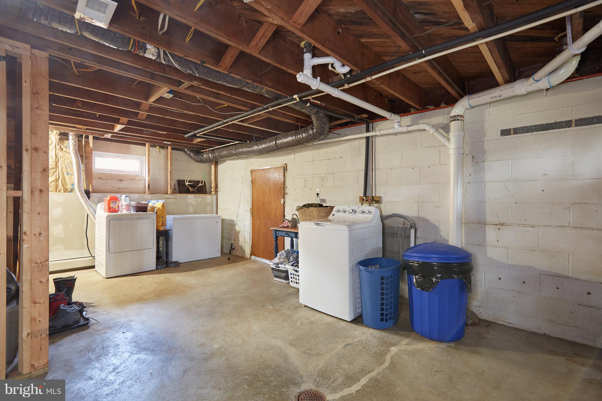 4910 Old Swimming Pool Road Frederick, MD 21703 - Photo 25 of 26 a utility room with dryer and washer