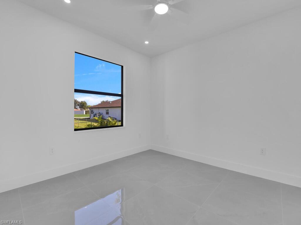 4450-4452 24th Street Southwest Lehigh Acres, FL 33973 - Photo 15 of 49 a view of an empty room