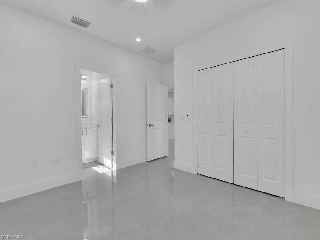 4450-4452 24th Street Southwest Lehigh Acres, FL 33973 - Photo 16 of 49 a view of an empty room