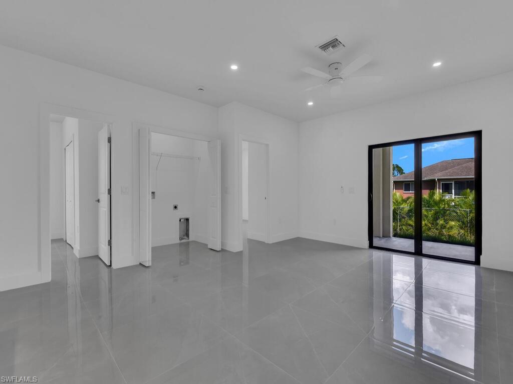 4450-4452 24th Street Southwest Lehigh Acres, FL 33973 - Photo 36 of 49 a view of an empty room with a window
