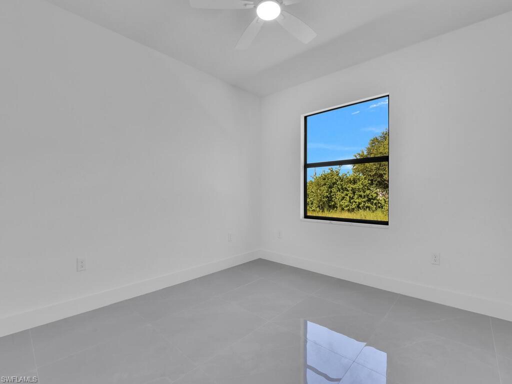 4450-4452 24th Street Southwest Lehigh Acres, FL 33973 - Photo 47 of 49 a view of an empty room